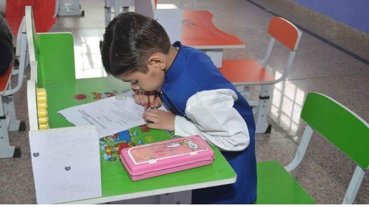 kid reading at nimt school avantika ghaziabad